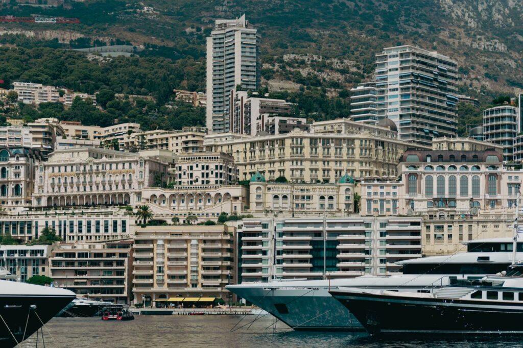 Breathtaking view of Monaco's luxurious harbor showcasing yachts and iconic architecture.