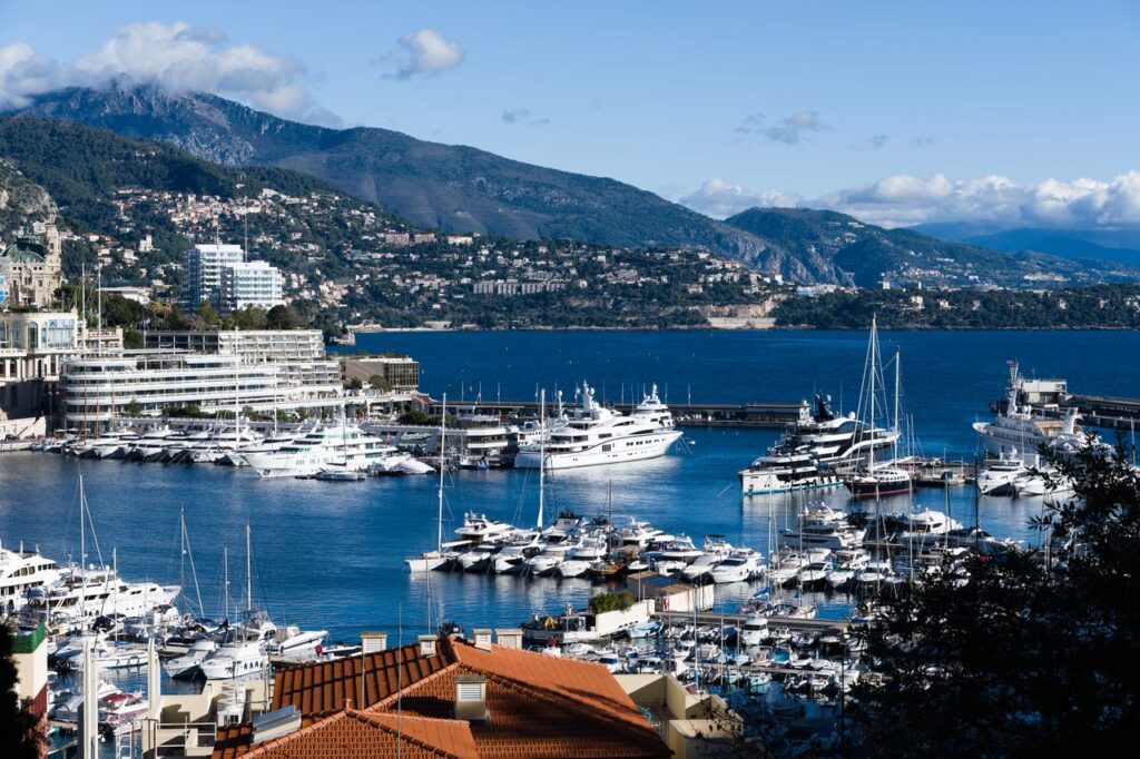 pexels-photo-30608241-30608241 Breathtaking view of Monaco marina with luxurious yachts and scenic backdrop.